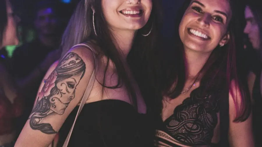Two friends dressed up for a night out at a Toronto nightclub
