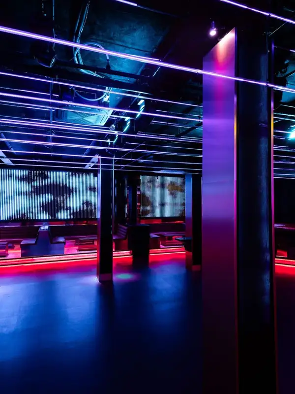 Main room with LED screens and stage lighting at DPRTMNT nightclub on Adelaide Street West