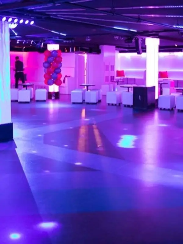 Dance floor and lounge seating at El Convento Rico on College Street