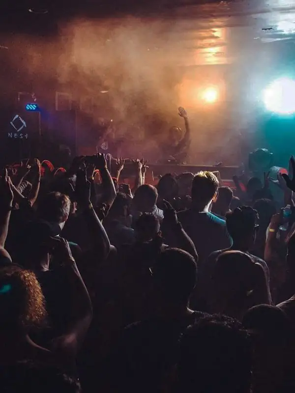 Crowd and stage haze at Nest nightclub on College Street