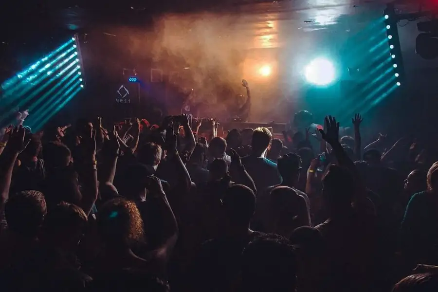 Crowd and stage haze at Nest nightclub on College Street