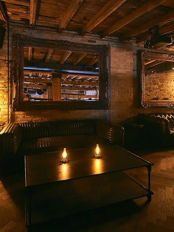 Candlelit brick lounge at Parlour on King Street West