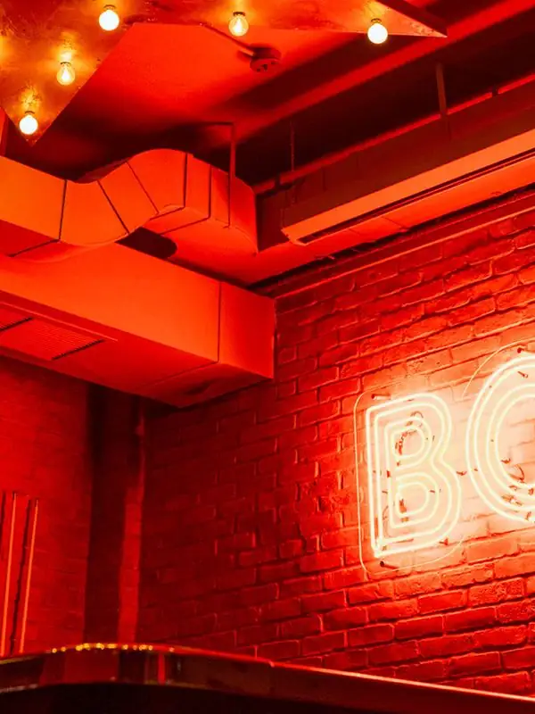 Red neon bar at Petty Cash on Adelaide Street West