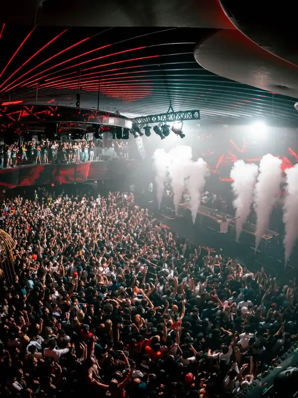 Packed main room with CO2 cannons at Rebel nightclub on Toronto's waterfront