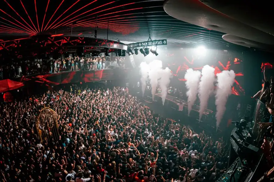 Packed main room with CO2 cannons at Rebel nightclub on Toronto's waterfront