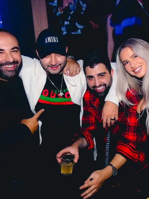 Guests posing at Ultraviolet Toronto